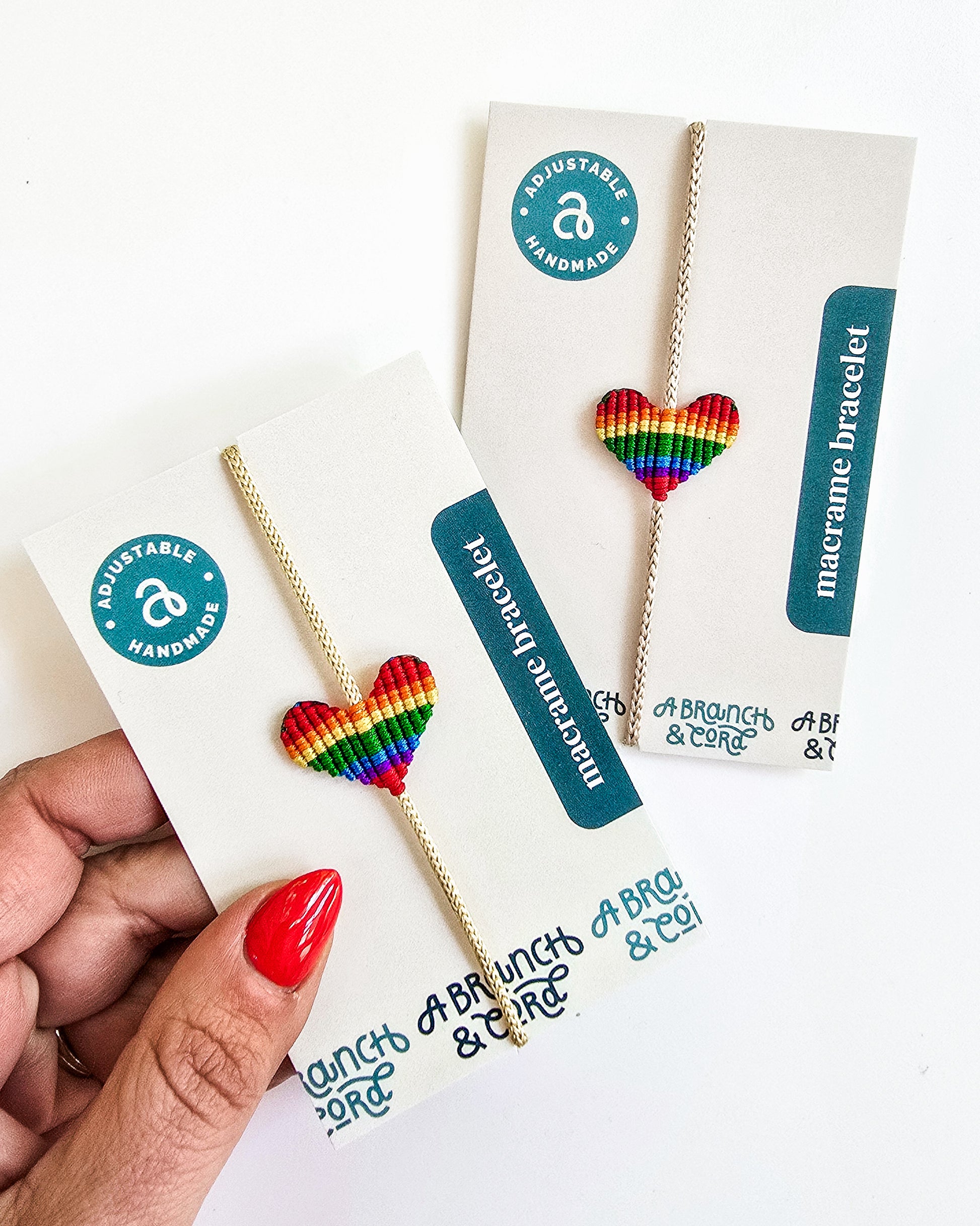 Macrame adjustable rainbow pride bracelet by A Branch & Cord.