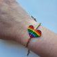 Macrame adjustable rainbow pride bracelet by A Branch & Cord. 