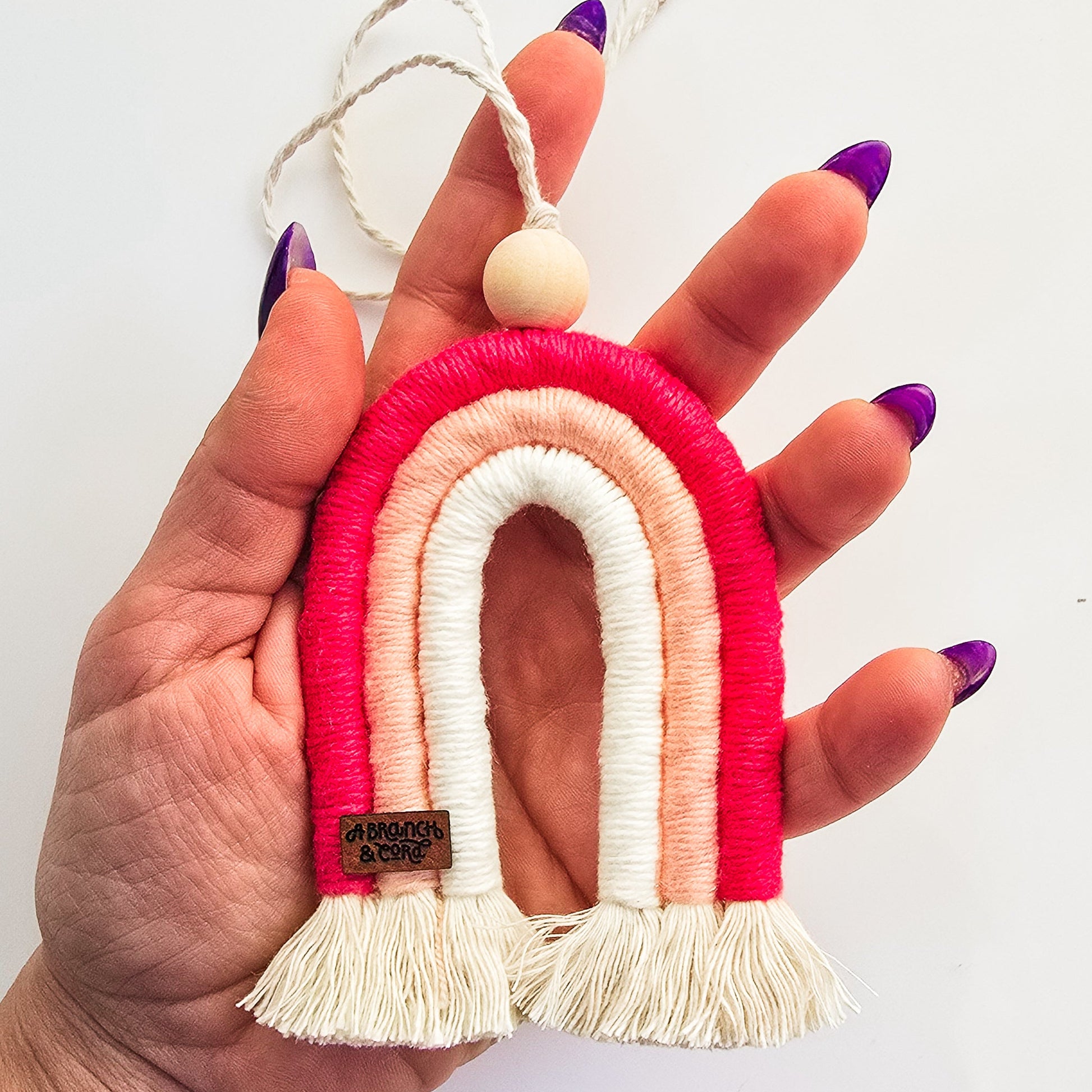 Hand holding rainbow diffuser